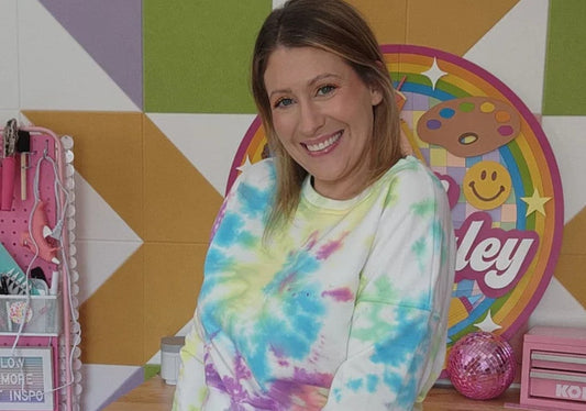 girl wearing a pastel glitter tie dye jogger
