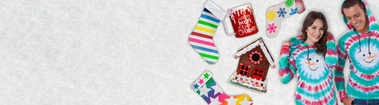 Two people wearing colorful snowman-themed onesies on a light gray background.