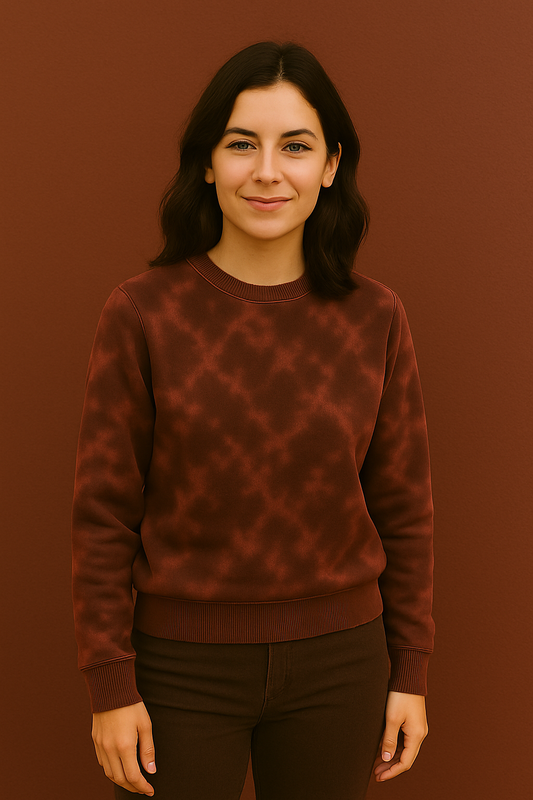 Woman wearing a patterned brown sweater against a matching background